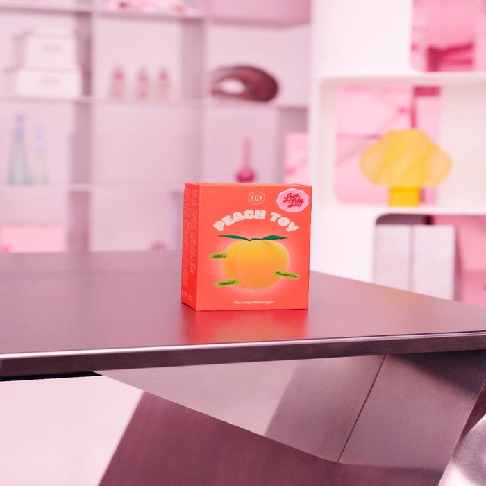 Lily Allen X Womanizer Peach - Toy stimulateur clitoridien