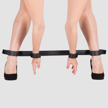 Barre d'écartement en cuir poignets et chevilles Deluxe