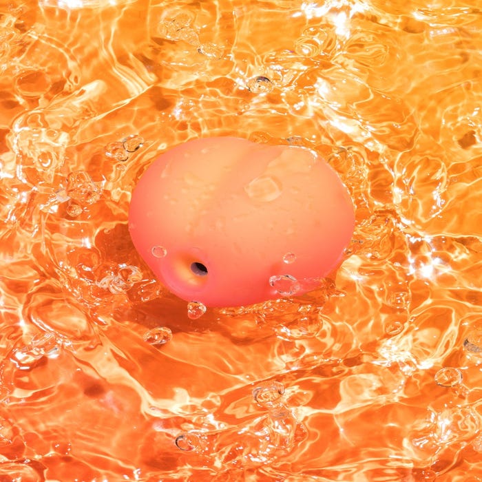 Lily Allen X Womanizer Peach - Toy stimulateur clitoridien