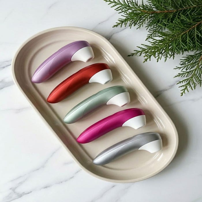 Womanizer Pro​ stimulateur clitoridien Vibrant Pink