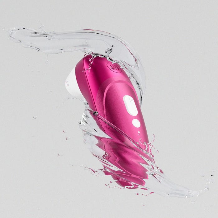 Womanizer Pro​ stimulateur clitoridien Vibrant Pink